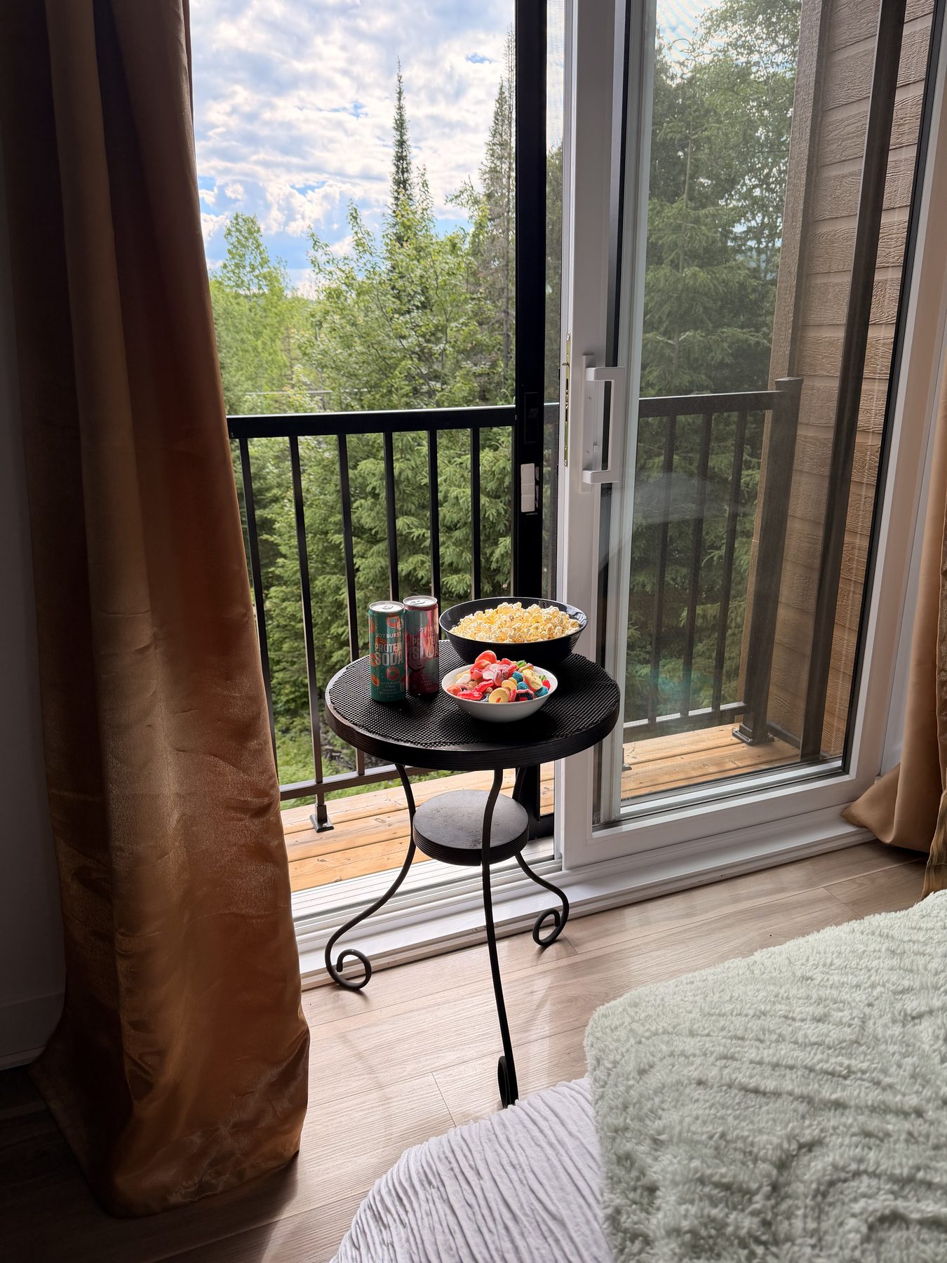 Popcorn, candy and drinks set out for a chalet movie night